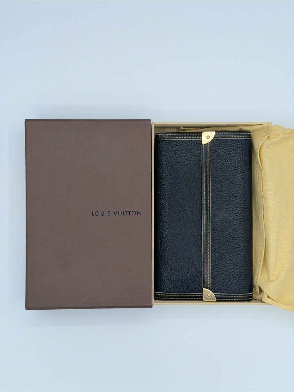 Louis Vuitton Suhali Porte Trésor International Wallet black goat leather